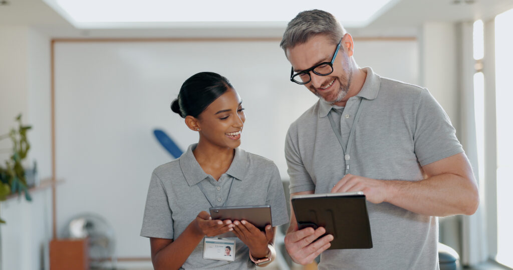 Physiotherapy, tablet and teamwork with people in clinic for chiropractor, search and telehealth. Rehabilitation, healthcare and website with man and woman for patient information, update and results.