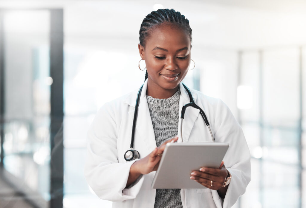 Doctor reviewing electronic health records on a tablet