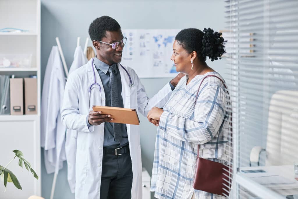 Healthcare provider using patient engagement tools on a tablet