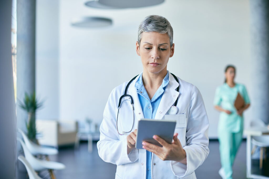 Doctor using a tablet in a medical office